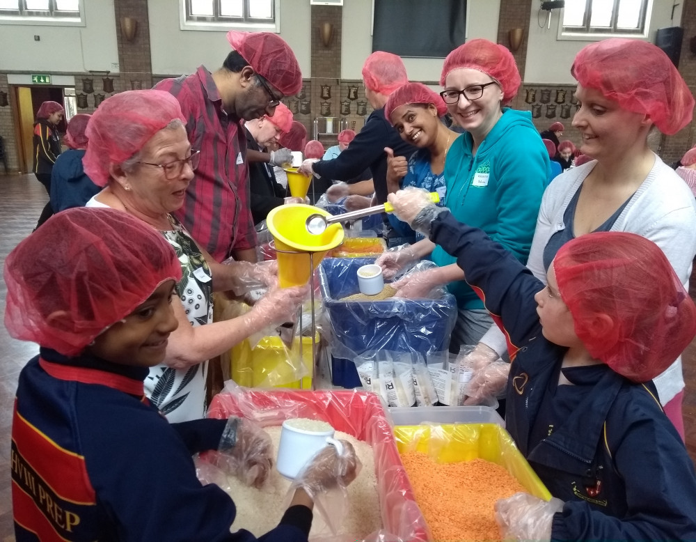 Local Rotary groups are returning to their food packing initiative with Feed the Hungry (Image supplied) Local Rotary groups are returning to their food packing initiative with Feed the Hungry (Image supplied)