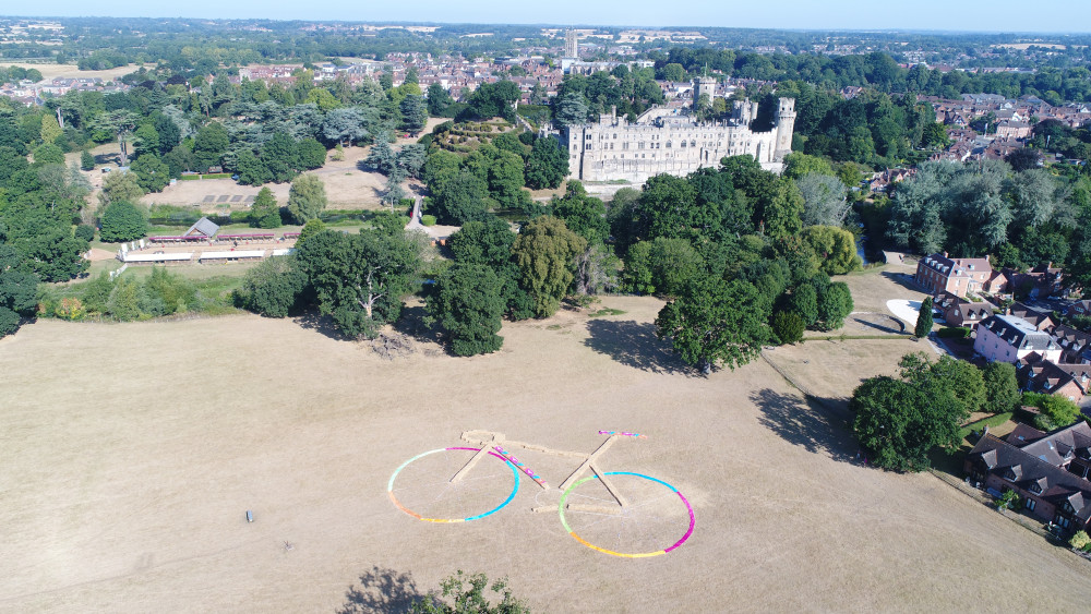 The bicycle was made of 252 bails of straw with the wheels made of brightly covered material (Image via WCC)