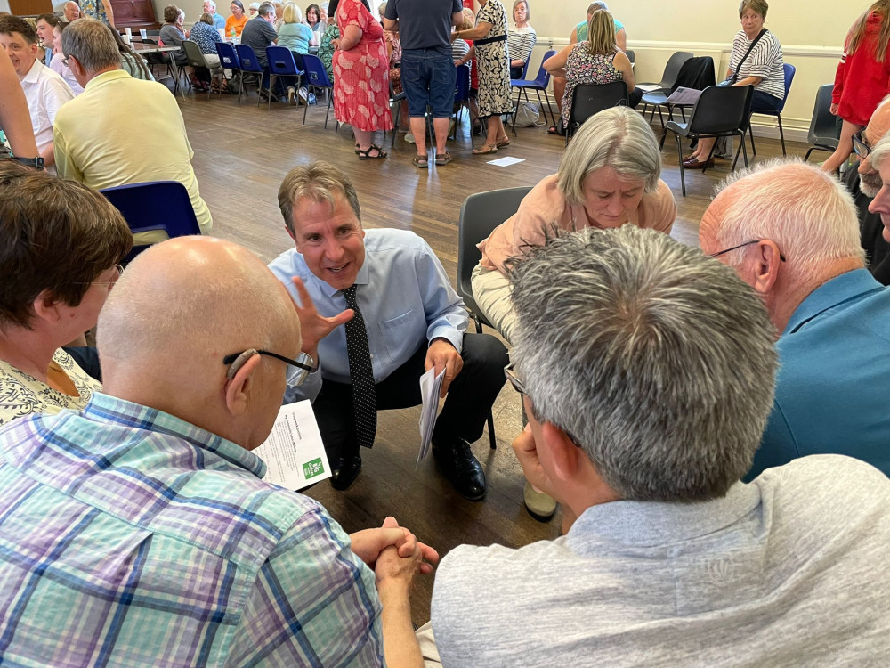 West of England metro mayor Dan Norris talks with residents, including South Gloucestershire Council opposition Lib Dem group leader Cllr Claire Young, at the Big Choices On Buses meeting at Yate parish hall on Monday, August 1 (Image free to use wit   Dan Norris Bus Driver Weca Pic West of England metro mayor Dan Norris on a bus with a driver (Image: West of England Combined Authority, free to use by all partners)