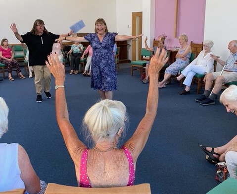 Sue Haswell left and Susan East right pretending to fly (Credit: Winnie Cameron)