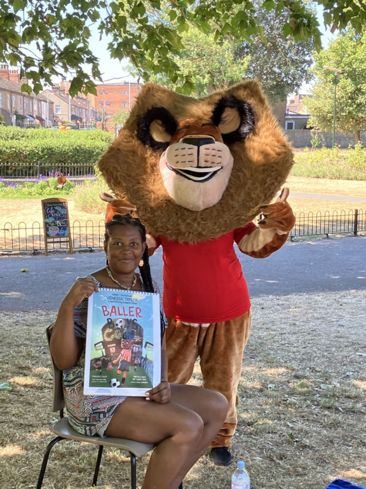 Venessa Taylor and Marley the Lion. 