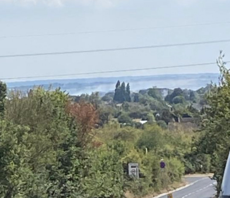 Smoke rising from fields close to Coalhouse Fort