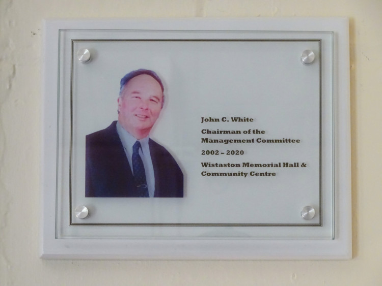 A memorial plaque, remembering Mr John White, who died of cancer in 2020 (Jonathan White).