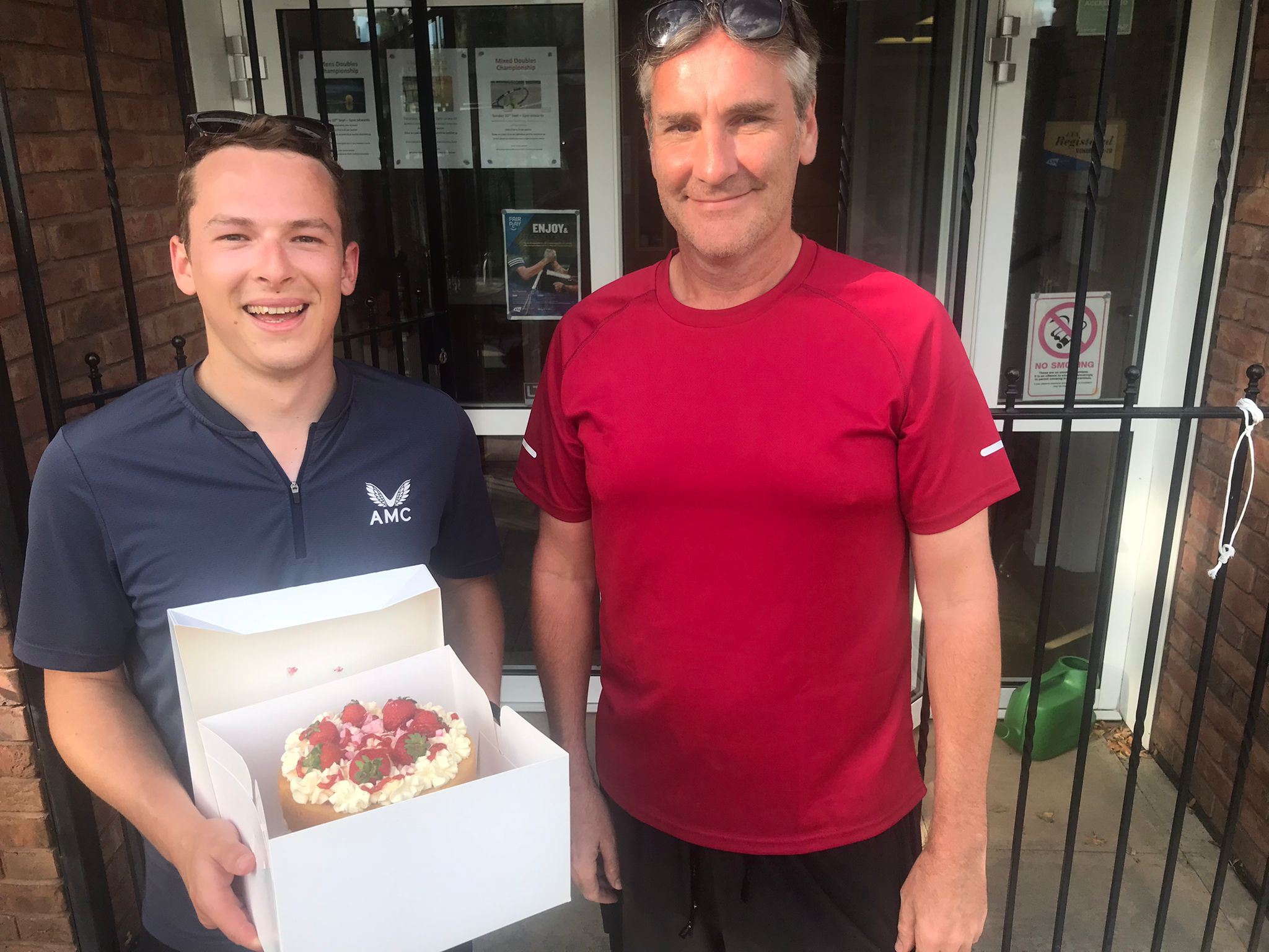 Plate runner up Sam Maxwell receives his prize from club chair Rob Mcninch.