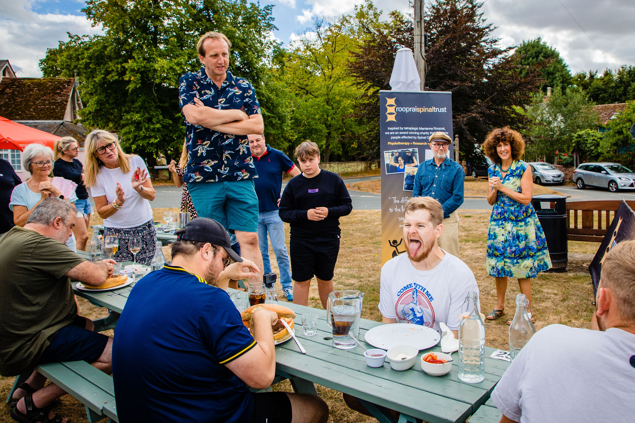 YouTuber downs 4lb burger – with sides – to win county contest. CREDIT: Danny Loo/StrandPR