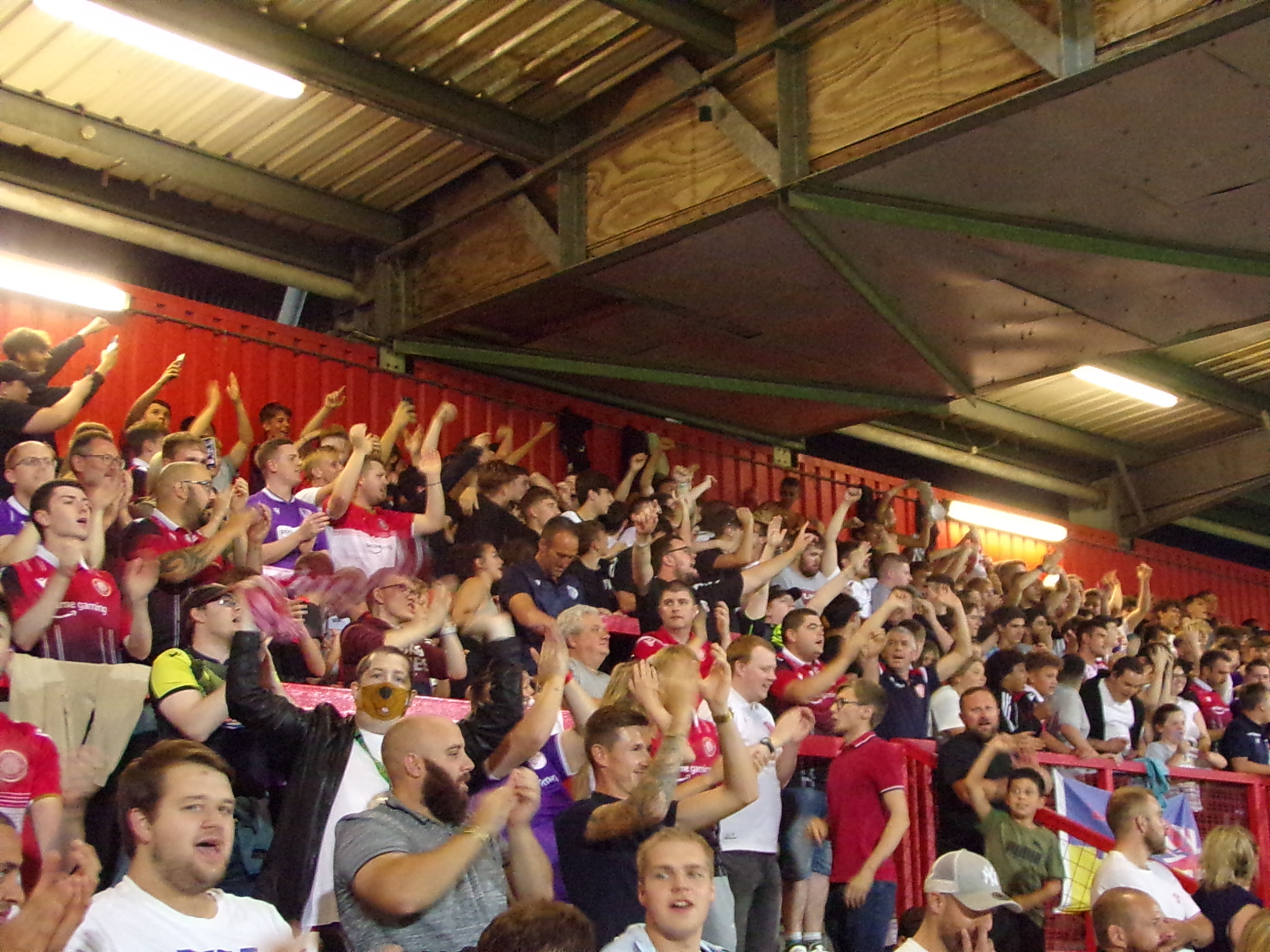 Stevenage fans celebrate at the final whistle. CREDIT: George Bigley 