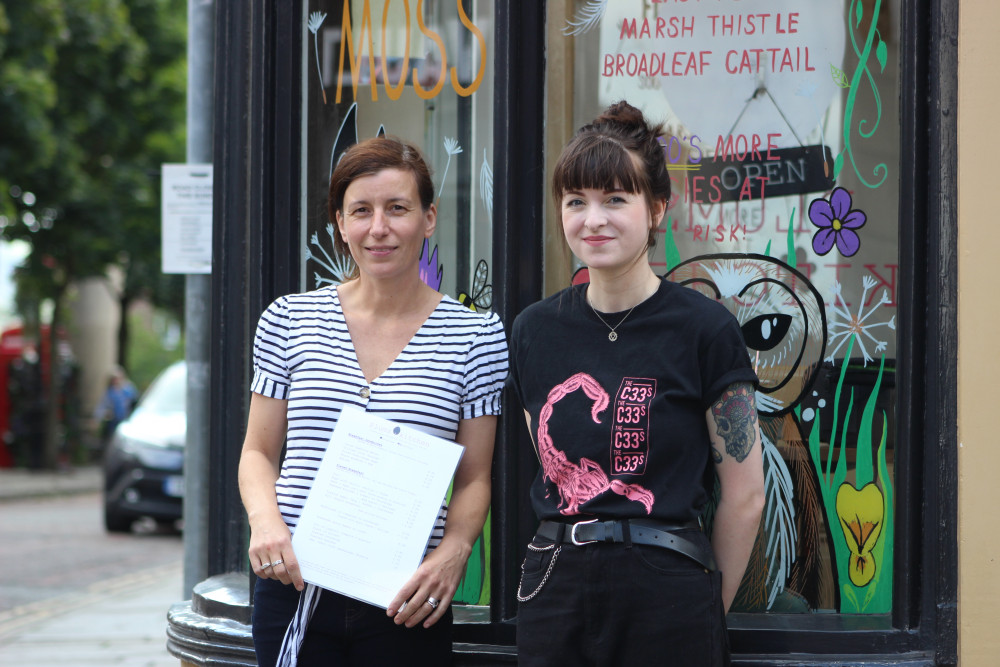 Lizzy Plumley (left) and Emma Whitworth (right) wanted to do something to raise awareness for the 'SAVE DANES MOSS' campaign.