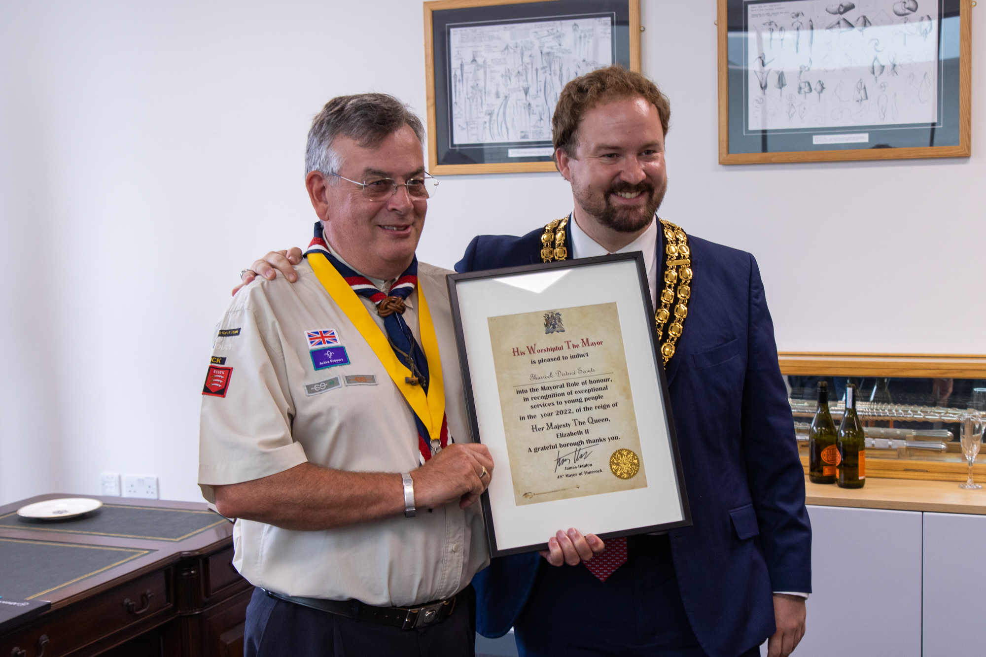 District Chair Geoff Harris being presented a certificate from Mayor Cllr James Halden