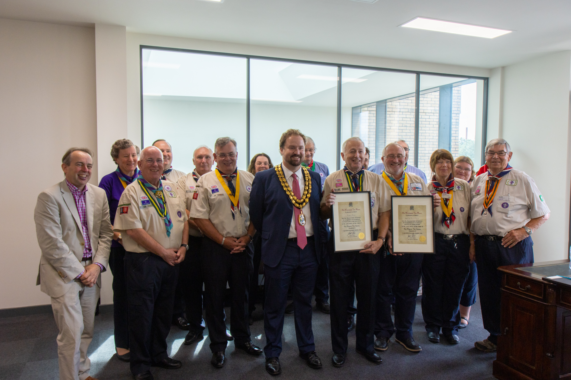 The delegation of Scout volunteers, alongside the mayor and Cllr Mark Coxshall.