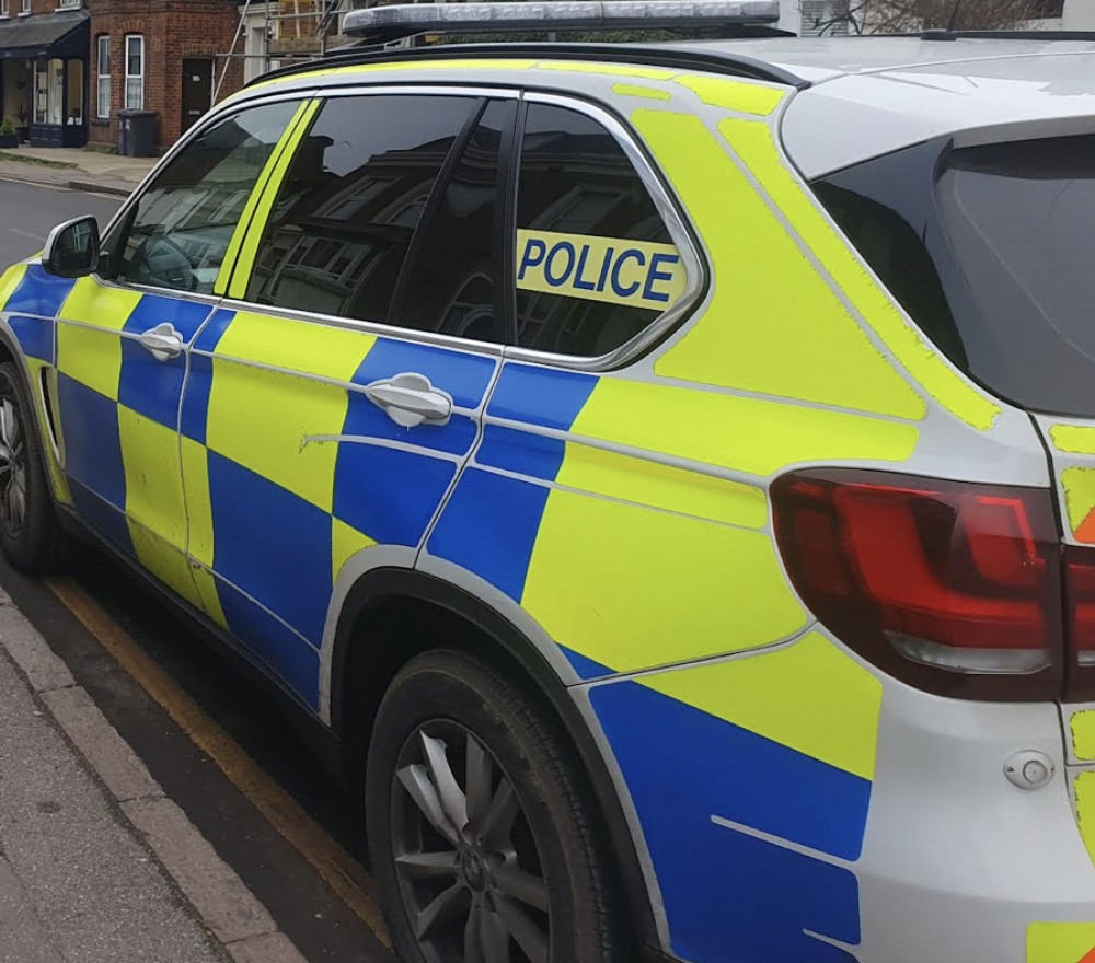 Armed police in 'military style' outfits were called onto the streets of Hitchin