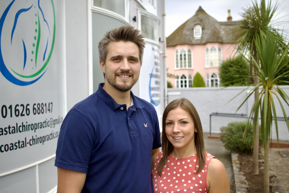 Lee Johnson and Jenni Wilson outside Coastal Chiropractic and Wellness Centre on Brunswick Place, Dawlish (Nub News/ Will Goddard)