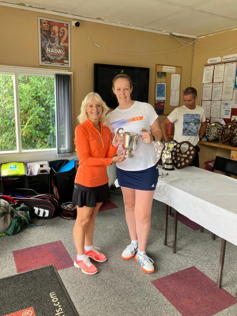 Jeannette Walker and Kathryn Barnett with the trophy for the ladies division one winners