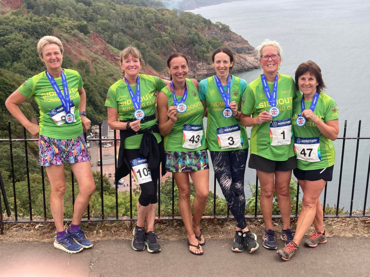 Jo, Jane, Leeann, Rachel, Alexa and Sarah wearing their marathon medals with pride (Sidmouth Running Club)