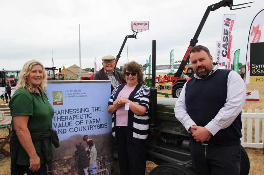 Chris Loder draws a winning ticket at the Dorset County Show.