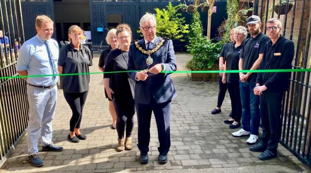 Wirral's Mayor, Cllr Jeff Green, declares the courtyard cafe open