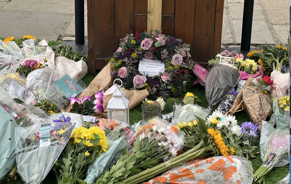 The number of flowers laid in honour of our late Queen Elizabeth II has grown in Hitchin Market Place. CREDIT: Picture taken on Saturday morning by @HitchinNubNews