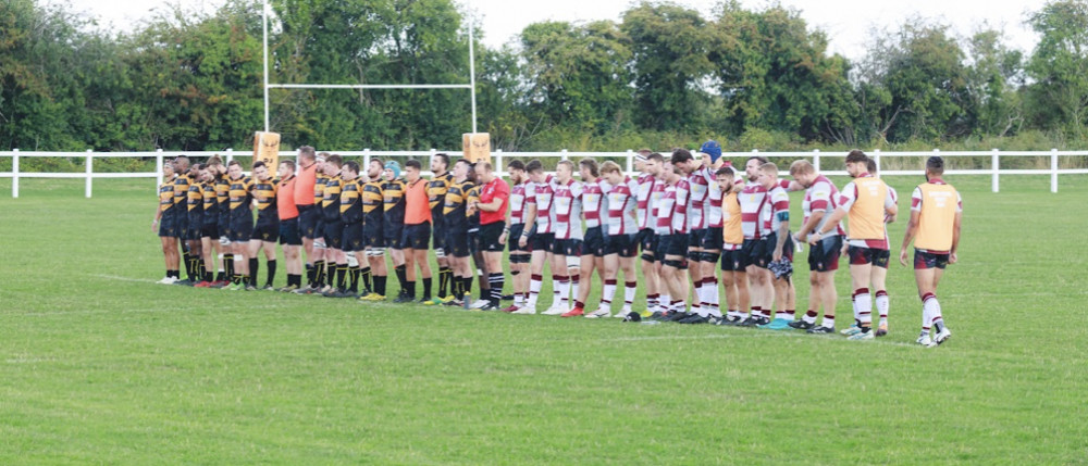 Letchworth Rugby Club and opponents Brentwood pay tribute to our late monarch before the match. CREDIT: Paddy Allen