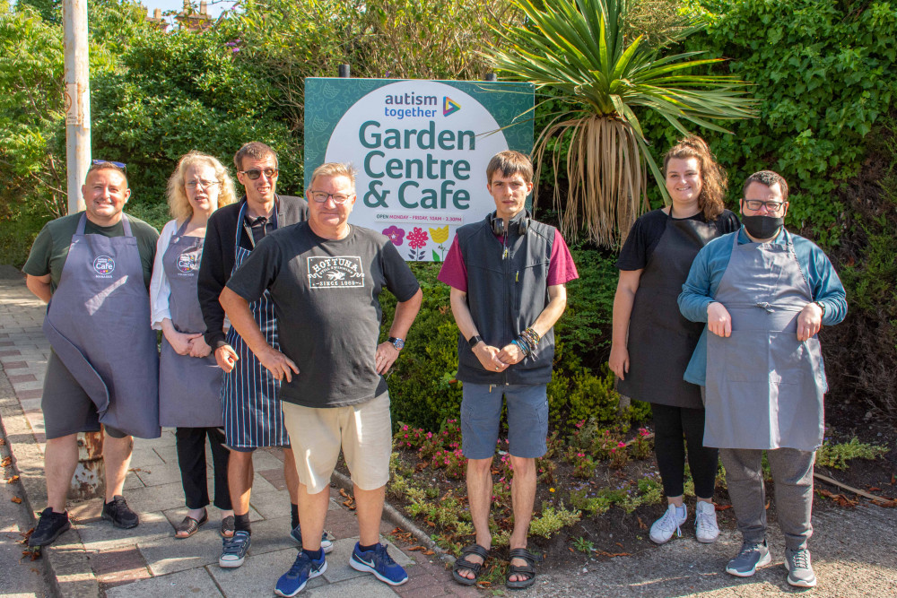 The team of staff and autistic volunteers behind the reopened Bromborough Pool Garden Centre