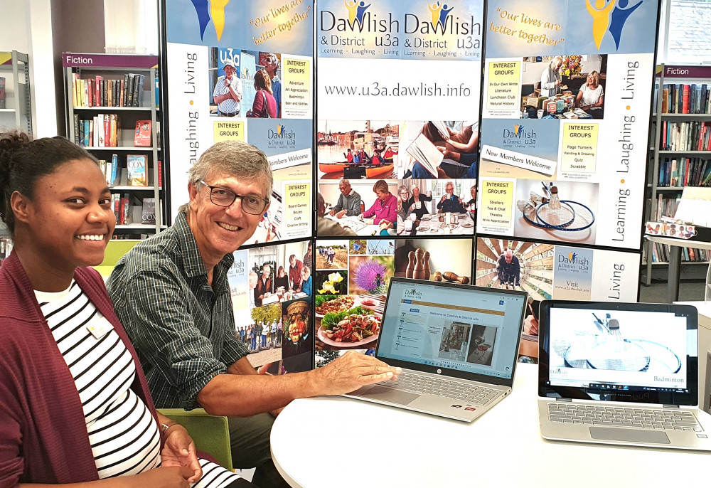 Librarian Corina Skerritt and Dawlish & District u3a Chair John Vick in Dawlish Library (Dave Pickton)