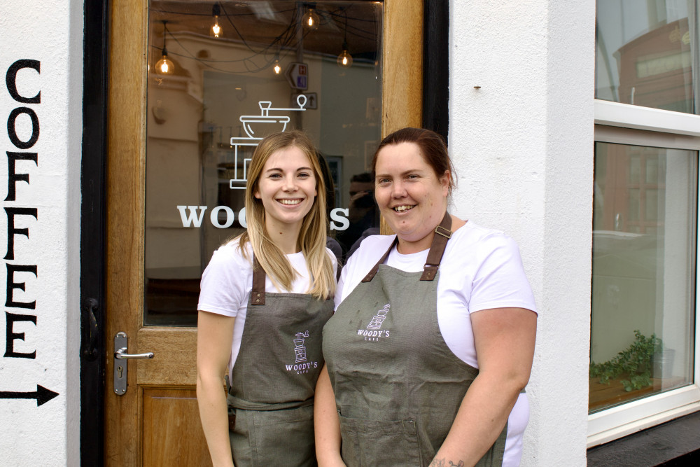 Owner Kimberley Woods and employee Jen outside Woody's Café on Queen Street, Dawlish (Nub News/ Will Goddard)