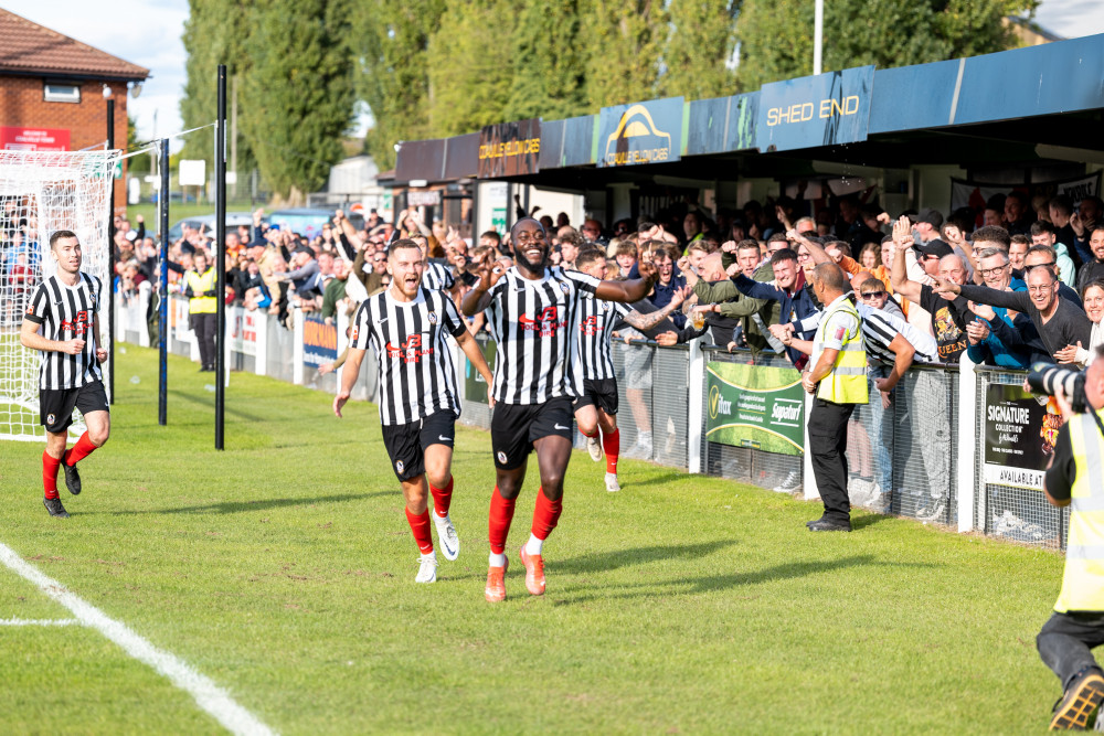 Tendai Chitiza celebrates after scoring Coalville's late winner