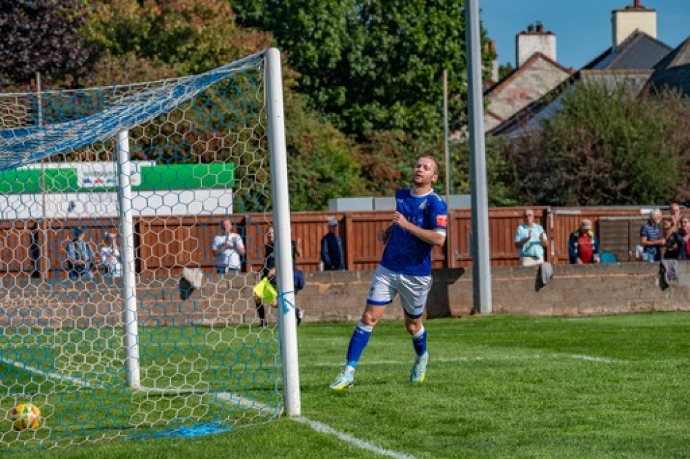 Aarron Denny wheels away after putting the first goal away for Town in their 4-1 victory