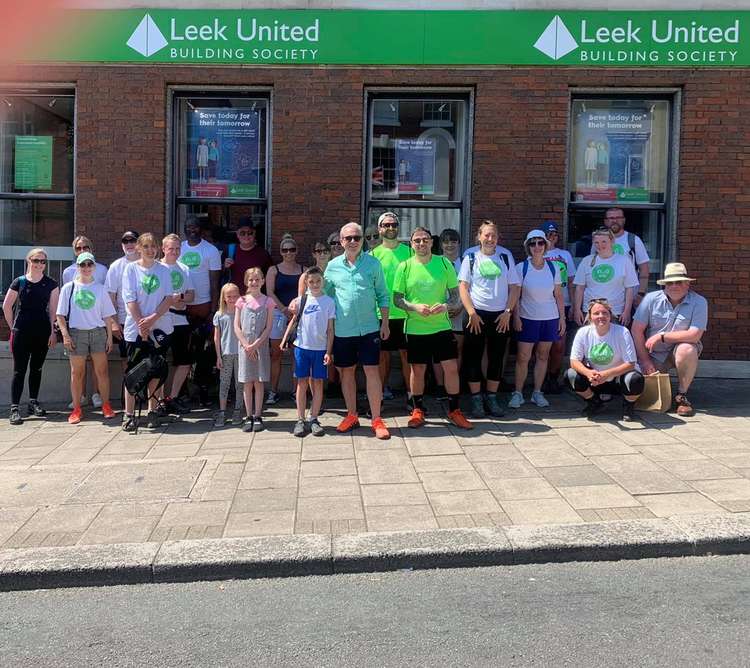 Leek United Chief Executive, Andrew Healy with the walkers on part of their route through Leek