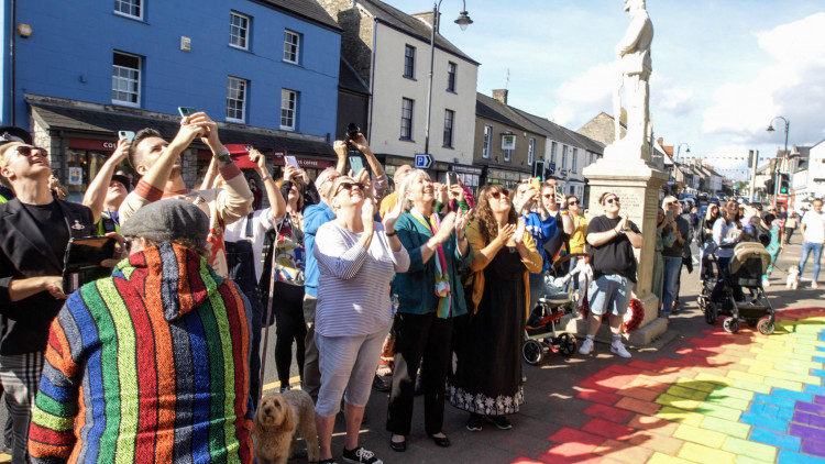 Hundreds of members of the Cowbridge community gathered outside the Town Hall as the LGBTQ+ flag was raised by Mayor John Andrew and Cowbridge Pride founder Ian H Watkins from pop band Steps.