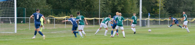 Marauding Lloyd Clarke whipping the ball in for Hadleigh (©NubNews)