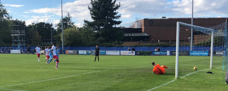 Brad Ihionvien's penalty rolls across the line after striking a post. Picture by Scott Mitchell. 