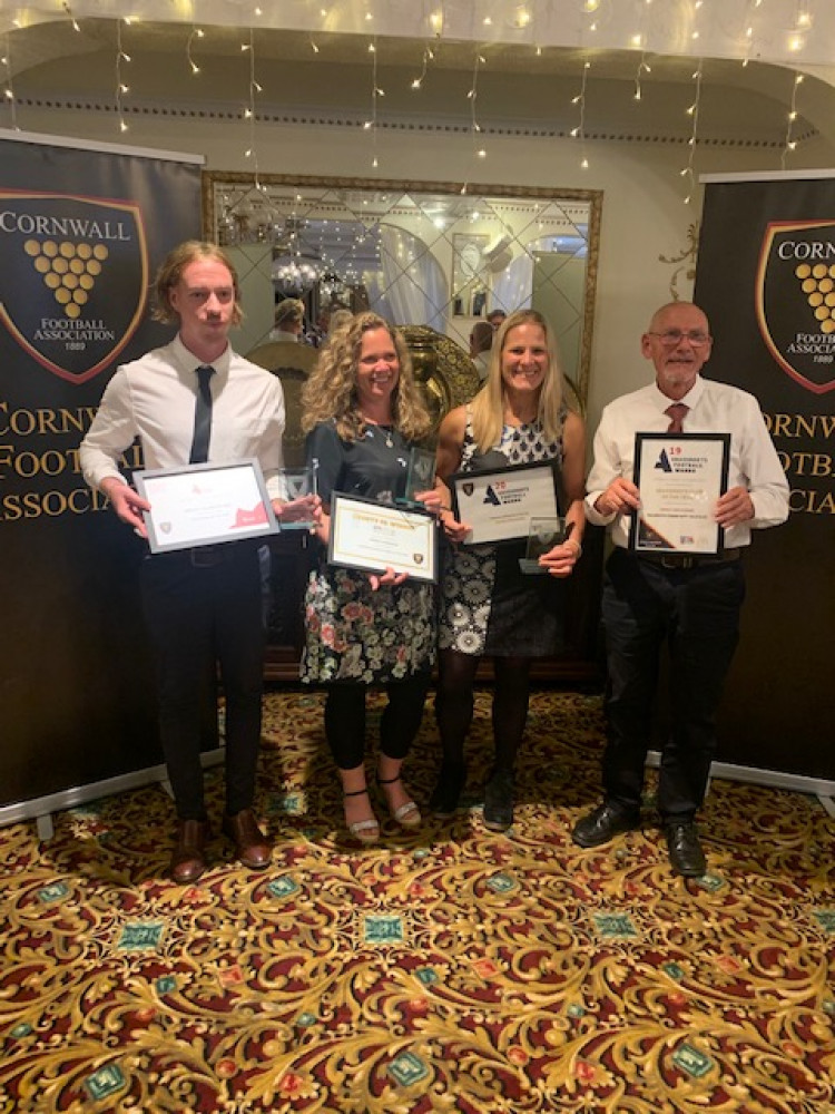 Ashley, Penny, Janine and Arno collecting their awards.