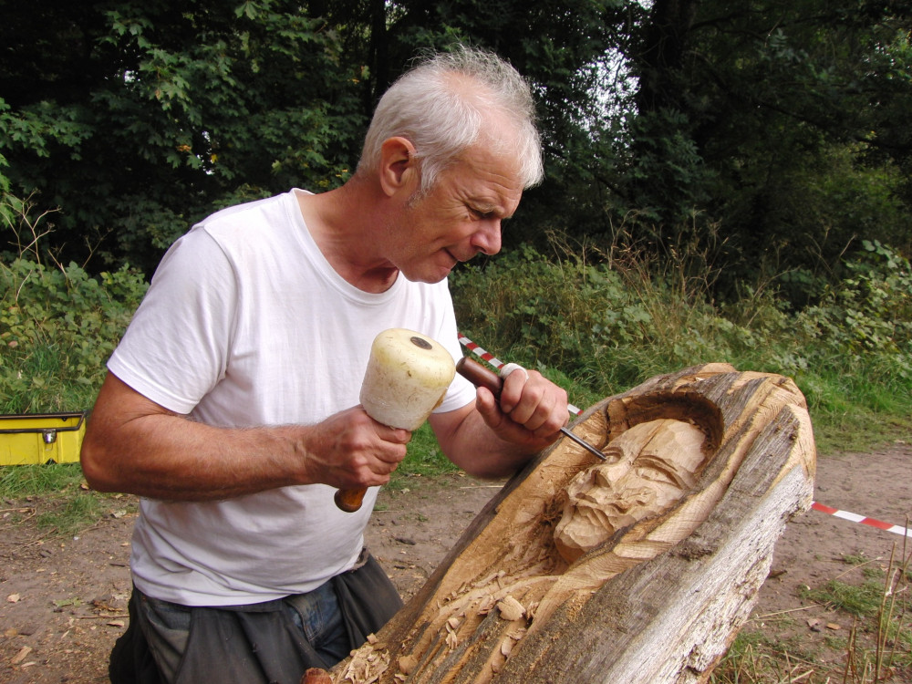 Graham Jones was in Priory Park last Thursday demonstrating his wood carving skills (Image by Geoff Ousbey)