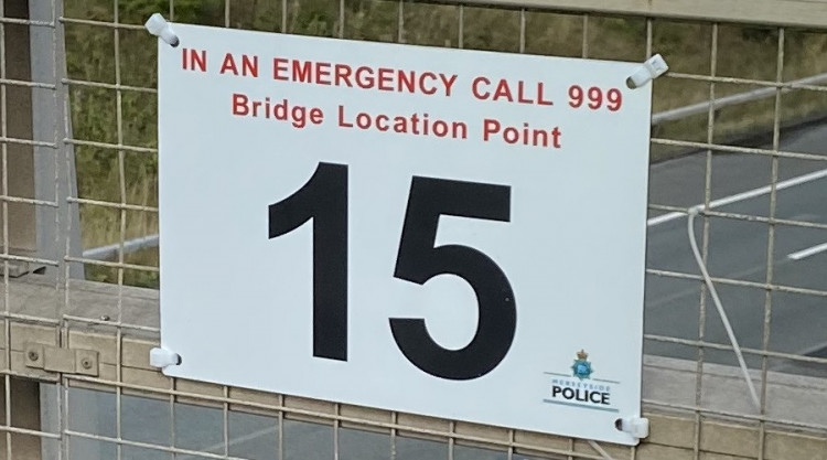 One of the new location signs on a bridge over the M53