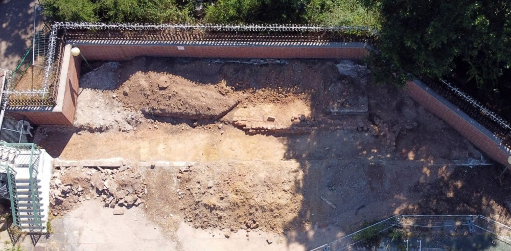 The remains of a medieval wall were discovered buried near Abbey Fields swimming pool in August (image via Sam Leach)