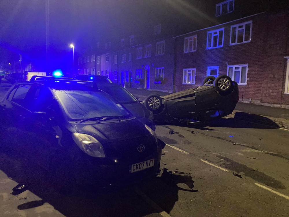 Car flips onto roof in Bridport. Picture credit: Peter Clark. 