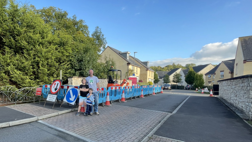 Cllr Mackay and family by the road works.