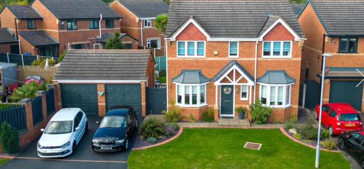 There is a double garage at the Thorn Tree Drive property.