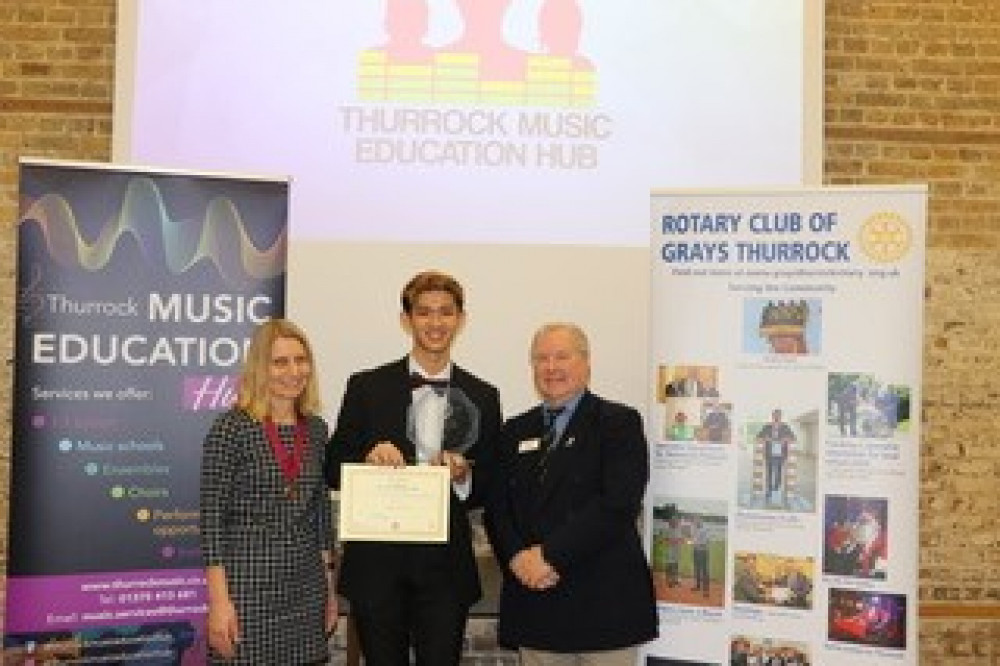 Last year's winner, cellist Sam Lee with Cllr Cathy Kent and Rotary Vice President Clive Page.