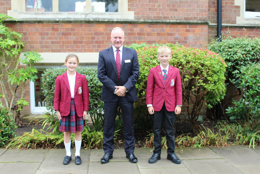 (From left) Head Girl Matilda Clarke, Headmaster Rob Duigan and Head Boy Leo Warne