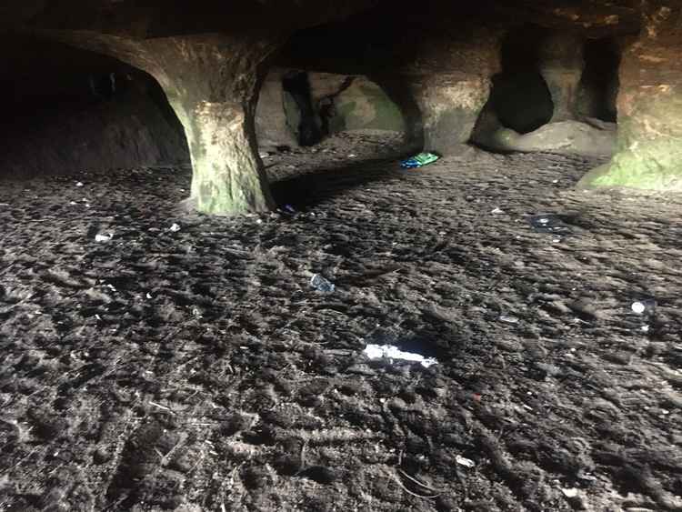 One of the caves before Tim and William cleared the rubbish. Image: Tim Kynaston