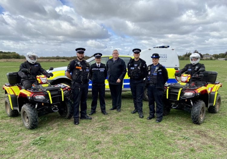 Ch Insp Mark Barber (third from left) and Cllr Rob Gledhill (centre) with members of the community policing team