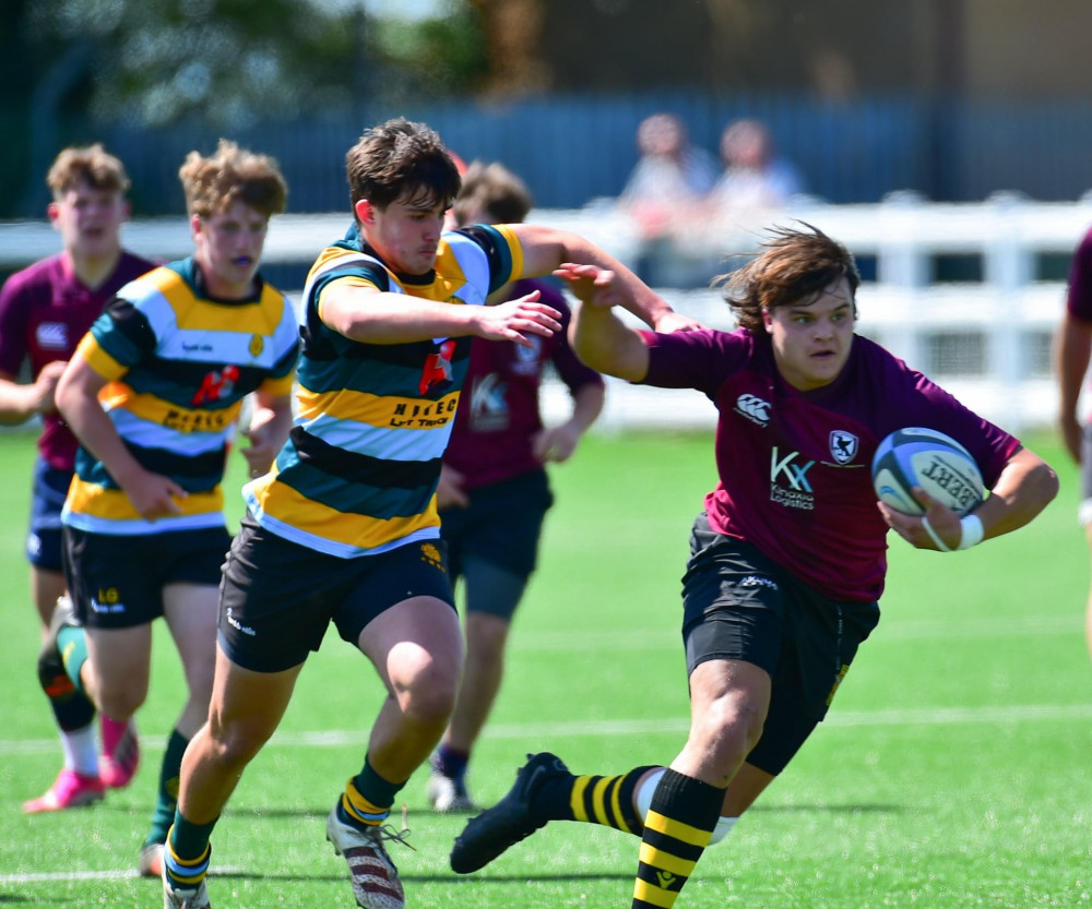 Hand off from Eastern Counties forward Sam Gibson (Picture contributed)