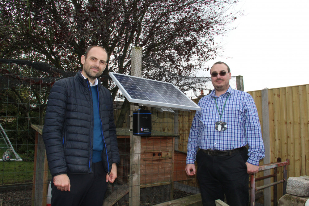 Councillor Andrew Woodman, North West Leicestershire District Council, speaks to Environmental Protection Officer Gareth Woodman about the monitoring equipment installed in Donisthorpe