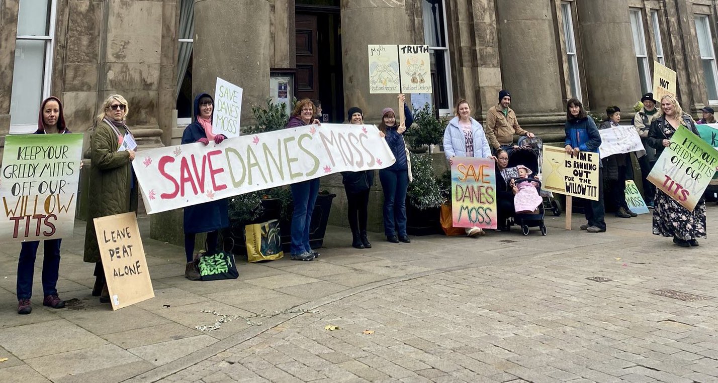 Save Danes Moss supporters demonstrate outside Macclesfield Town Hall on Market Place. (Image - Russ Hope / ELOV)