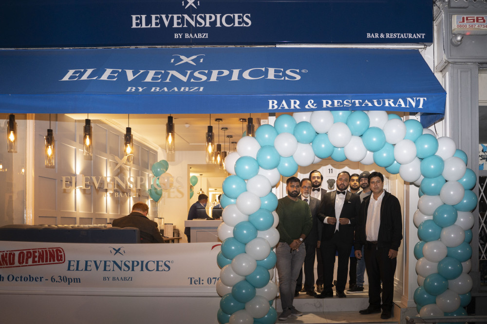 Owners Baabi Miah and Naseer Hussain at the opening of Eleven Spices on Spencer Street (image supplied)