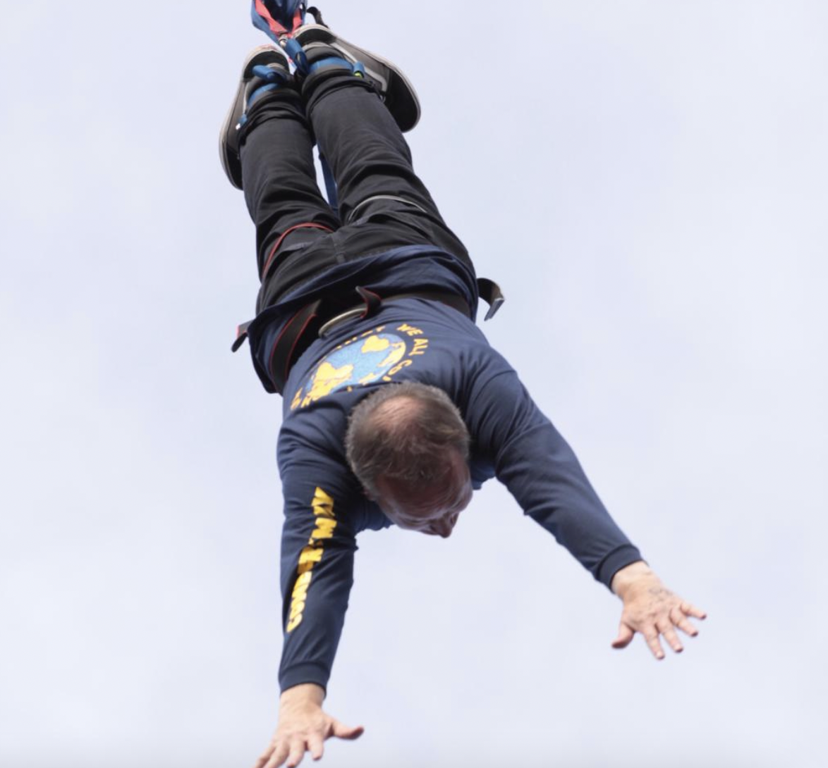 Hitchin head Steve Mills flies through the air. CREDIT: Whitehill School/Kate Halpin