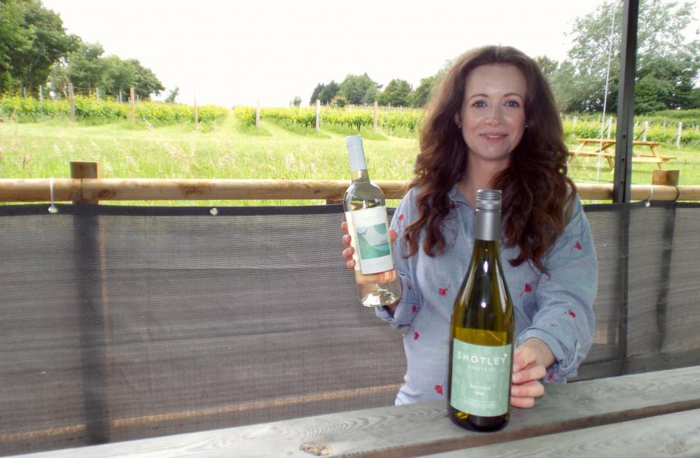 Charlotte Davitt-Mills with Shotley Vineyard wine (Picture: Peninsula Nub News)