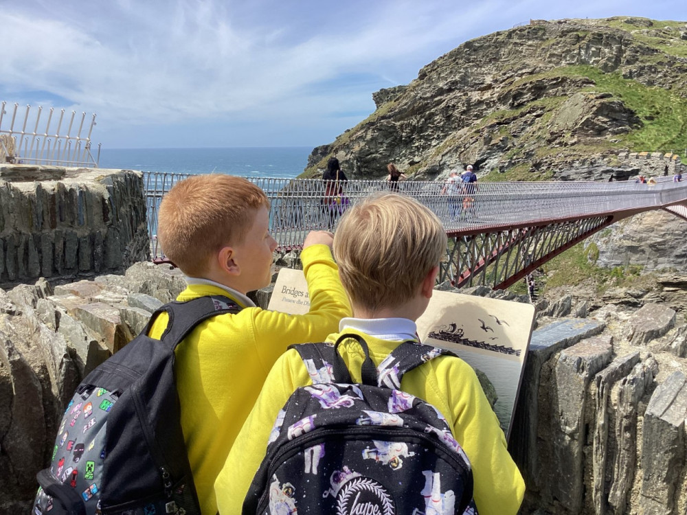 School children enjoying a trip to Tintagel Castle, made possible by the Transport Grant Scheme- Photo Credit Cornwall Heritage Trust  