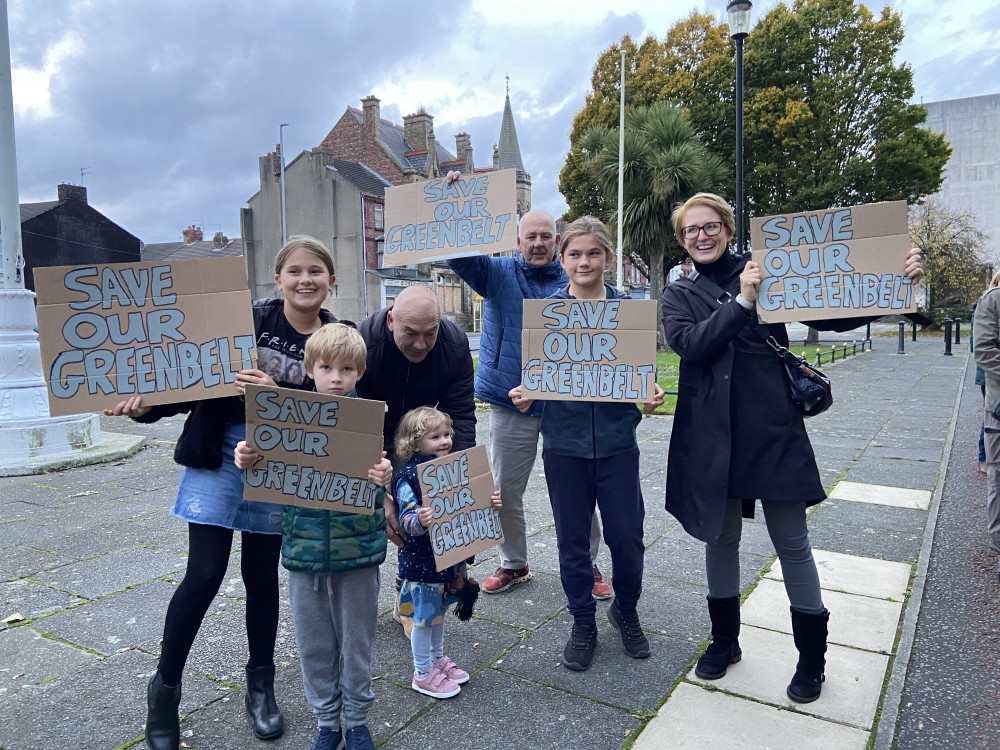 Vicky Shephard (far right) with two of her children as well as other people protesting against the application. Picture: Ed Barnes.