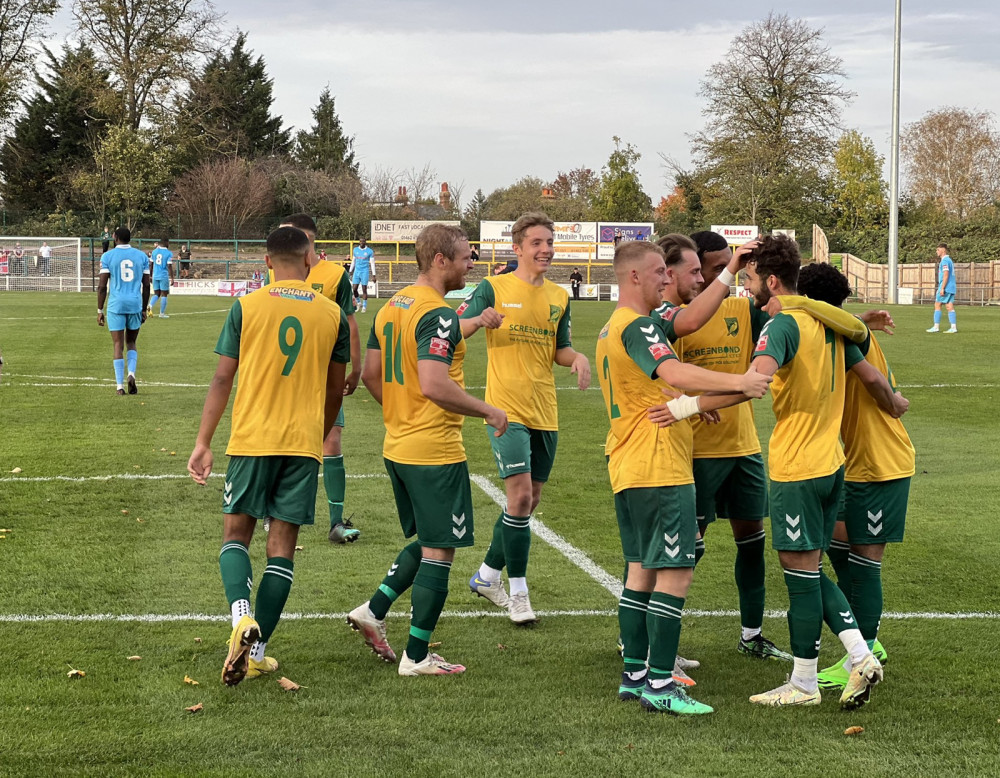 Hitchin Town 3-2 Potters Bar Town: PICTURE: The Canaries celebrate Diogo Freitas-Gouveia's wonder strike. CREDIT: @layth29